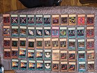 All 54 Yu-Gi-Oh! cards laid out front-side up