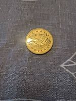 Reverse side showing loon design, CANADA, DOLLAR, dates 1987-1997