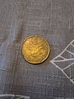 Reverse showing loon design and denomination