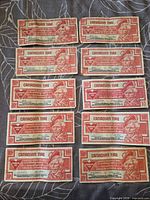 Front view of ten 10¢ Canadian Tire coupons showing portrait side