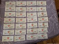 All 28 Canadian Tire 5-cent notes arranged in rows