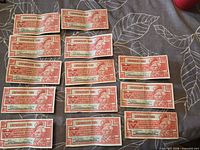 Fronts of 13 Canadian Tire 10¢ notes