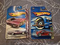 Front view of both Hot Wheels blister packs displaying cars