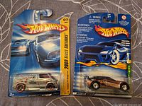 Front view of both blister-packed cars side by side