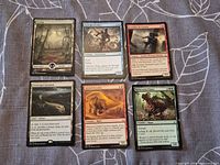 Front view of all six cards showing faces and artwork
