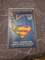 Front cover showing title, issue number, storyline text