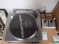 Top view of Audio-Technica turntable alongside Alesis iO2 Express interface