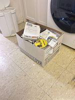 Full view of box with discs and manuals visible