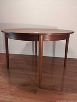 round wood dining table side view