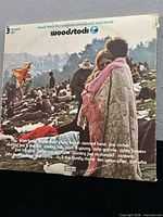 Front cover of Woodstock three-LP set