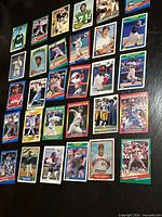 All 30 sports cards laid out face up