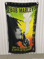 Full view of Bob Marley decorative flag hanging