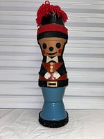 Full view of stacked terracotta pot toy soldier