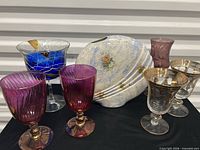 Group shot of all glassware and vase