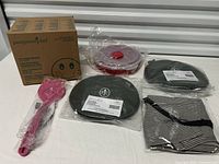 All six packaged Pampered Chef items displayed together