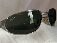 Front view of Ray-Ban Predator Sport sunglasses showing silver frame and dark lenses