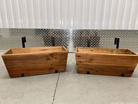 Two wood planter boxes front view