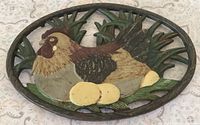 Front view showing painted hen design and overall shape