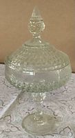 Full view of compote with lid showing pattern and pedestal