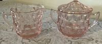 creamer and lidded sugar bowl front view