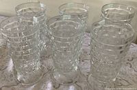 Six clear Whitehall pedestal drinking glasses upright