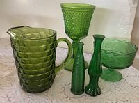 All five green glass pieces grouped