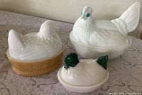 All three hen-on-nest covered dishes grouped