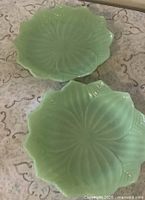 Two jadeite Lotus Blossom plates front view