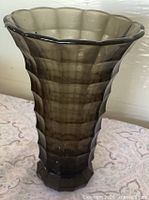 Full view of smoked glass vase showing overall shape and texture