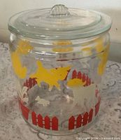 Side view of jar showing nursery motif and shape