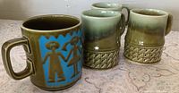 All four mugs front view