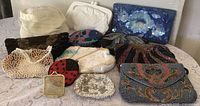 group shot of hat and all purses on table