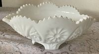Side view showing bowl profile, pattern and foot