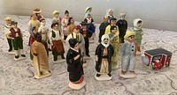 Front view of assembled figurines with teapot