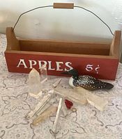 Entire lot showing apple box, loon figurine, assorted quartz pieces