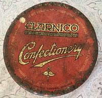 Top view of Clarnico Confectionery tin lid showing graphics