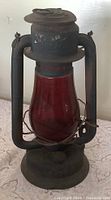 Front view showing Beacon stamp, red globe, overall wear