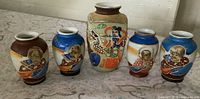 Front view of five miniature Satsuma vases