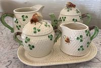 Full view of five-piece bee motif tea set