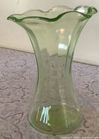 Front view of flared uranium glass vase