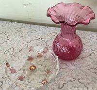 Cranberry vase and Walther Glas dish side by side