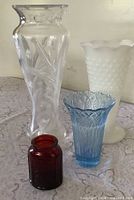 Group view of all four vases showing relative sizes and colors