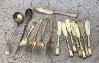 All flatware pieces laid out showing quantity and types