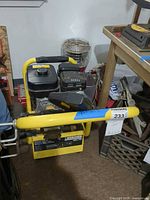 Full view of Karcher pressure washer with hose
