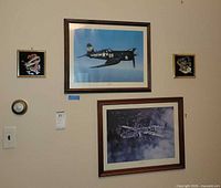 Overall wall view showing all four framed prints in position