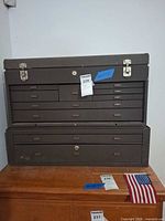 Front view of steel machinist toolbox showing drawers and latches