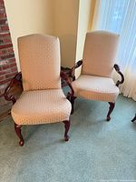 Front view of both Queen Anne style armchairs