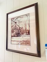 Full view of framed print on wall