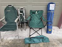 All four chairs: two L.L.Bean chairs (one open, one folded), carry bags for Tommy Bahama and Monrovia