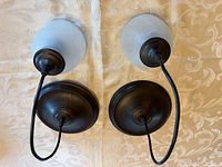 Top view of both pendant fixtures showing canopies, cords, shades